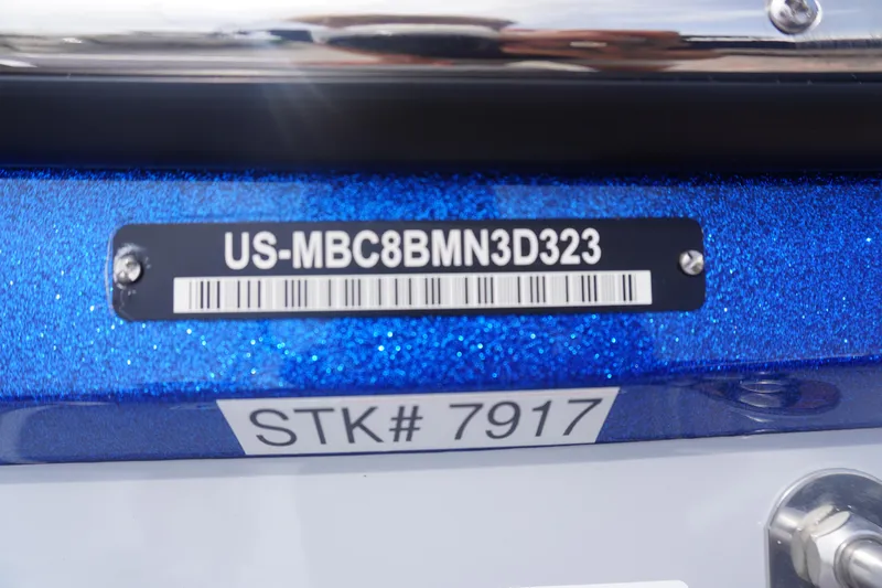 Slide: The Image of 2023 MasterCraft NXT24 boat identification plate with serial number and stock number. - 8
