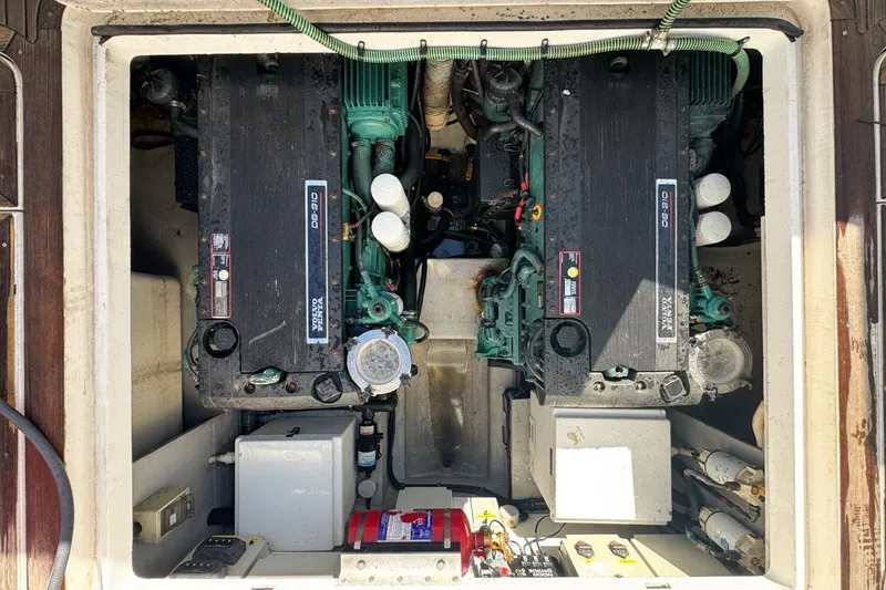 Slide: The Image of Engine compartment of a 2004 Sunseeker Sportfisher 37 with dual Volvo Penta engines. - 122