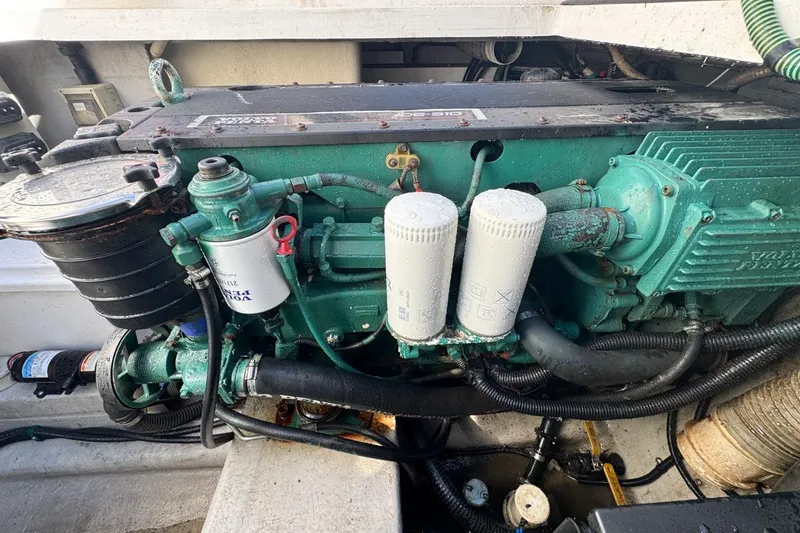 Slide: The Image of Engine of a 2004 Sunseeker Sportfisher 37 boat, featuring detailed components. - 126
