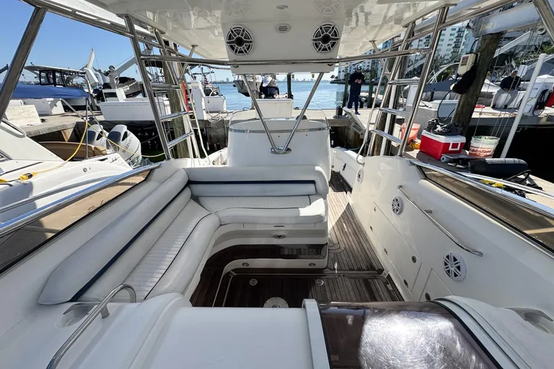 Slide: The Image of 2004 Sunseeker Sportfisher 37 boat interior with seating and dock view. - 42