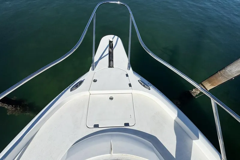 Slide: The Image of Bow view of 2004 Sunseeker Sportfisher 37 on calm water. - 49