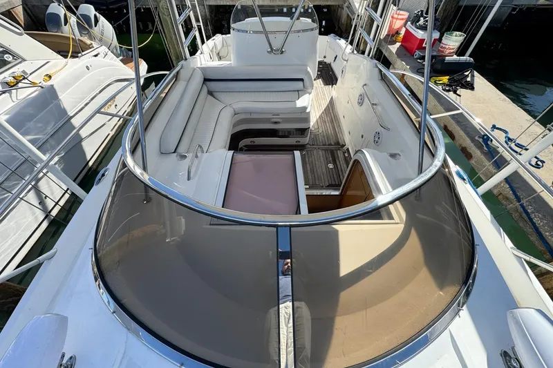Slide: The Image of 2004 Sunseeker Sportfisher 37 boat interior with seating and deck view. - 64