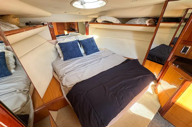 Slide: The Image of Luxurious cabin interior of 2004 Sunseeker Sportfisher 37 yacht with cozy bedding. - 98