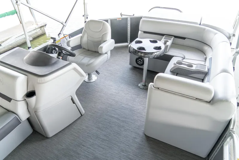 Slide: The Image of 2023 Godfrey Sweetwater 2186 C pontoon boat interior with seating and steering console. - 11