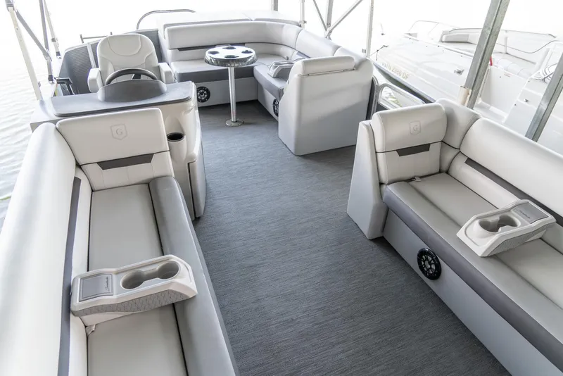 Slide: The Image of 2023 Godfrey Sweetwater 2186 C pontoon boat interior with plush seating and cup holders. - 6