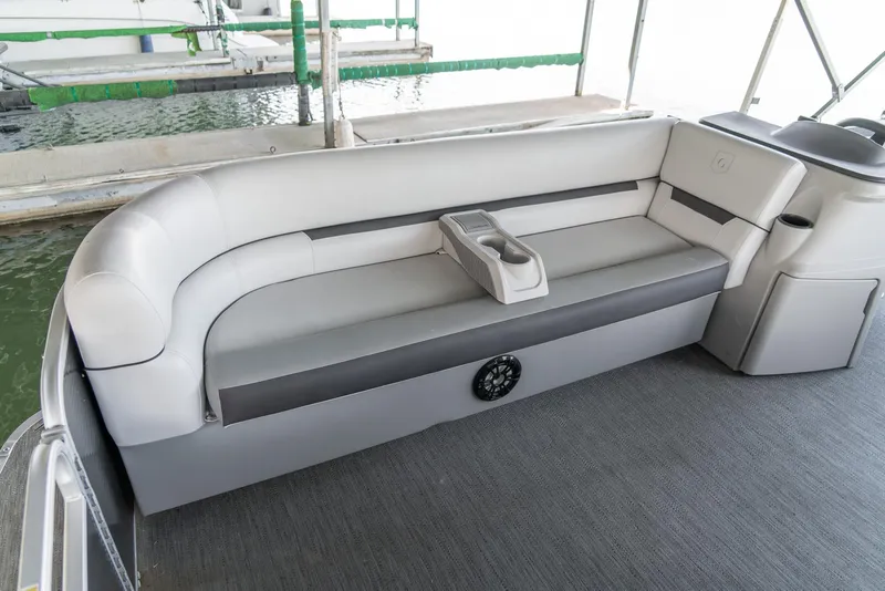 Slide: The Image of 2023 Godfrey Sweetwater 2186 C pontoon boat with gray seating and cup holders. - 9