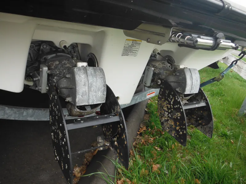 Slide: The Image of 2008 Yamaha Boats SX210 with barnacle-covered jet drives on a trailer. - 12