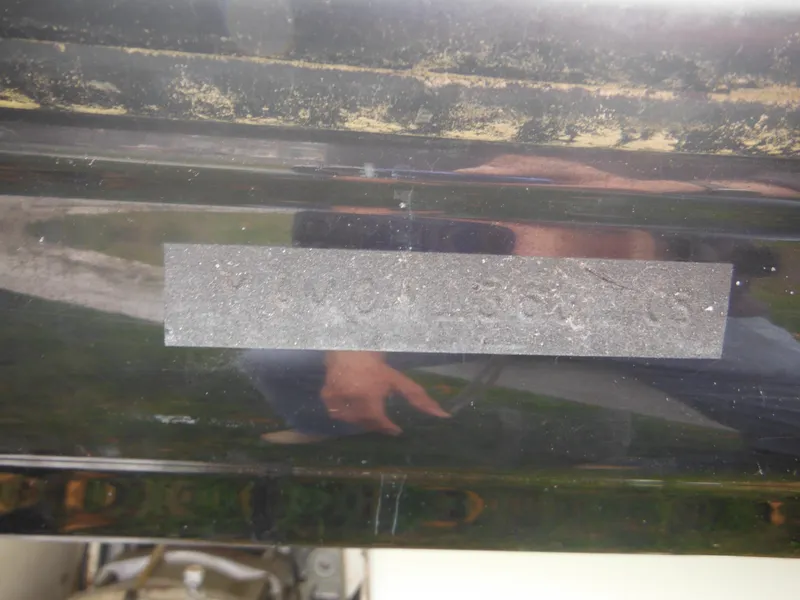 Slide: The Image of 2008 Yamaha Boats SX210 hull with a reflective surface and visible wear. - 14