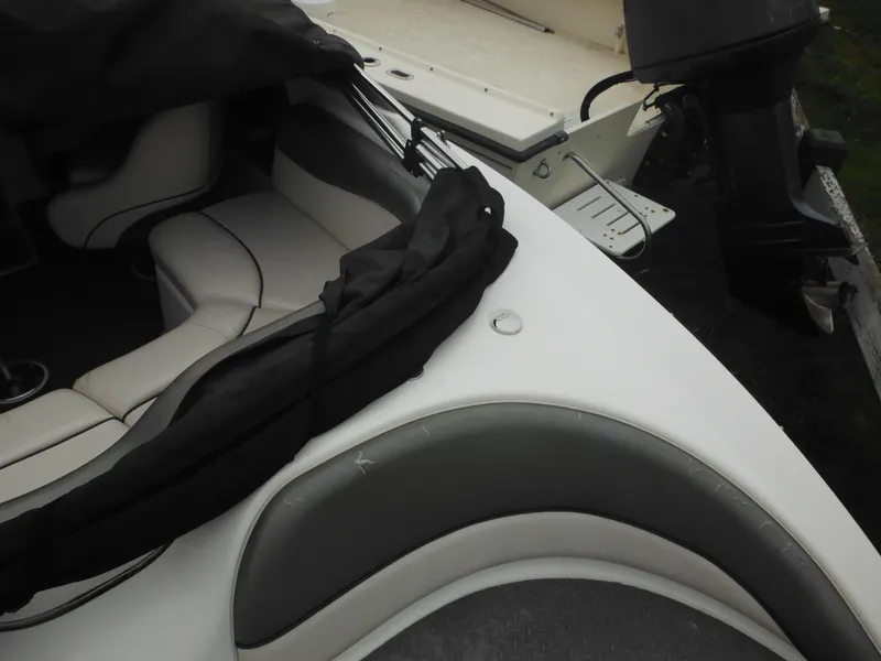 Slide: The Image of 2008 Yamaha Boats SX210 interior with seating and engine view. - 17