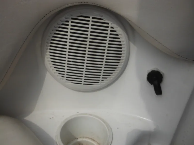 Slide: The Image of Speaker and cup holder on 2008 Yamaha SX210 boat interior. - 40