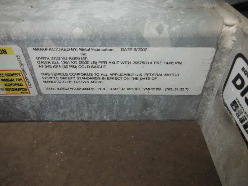 Slide: The Image of 2008 Yamaha Boats SX210 trailer label with specifications and compliance details. - 7