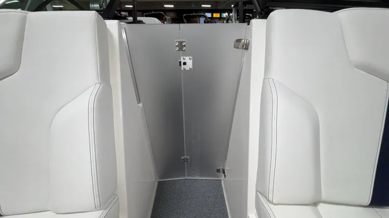 Slide: The Image of 2025 MasterCraft XT23 interior with white seating and sleek design. - 39