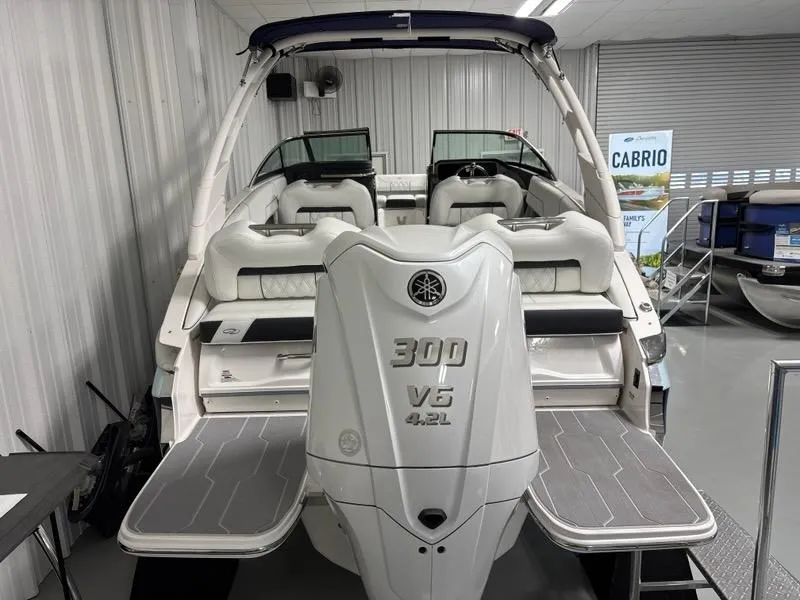 Slide: The Image of 2026 Regal LX4 boat with Yamaha 300 V6 4.2L engine in showroom. - 7