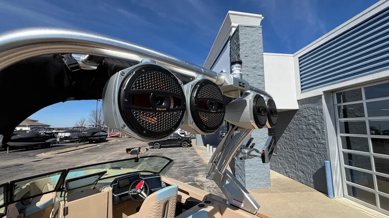 Slide: The Image of 2025 MasterCraft X26 boat speakers and tower in a sunny outdoor setting. - 16