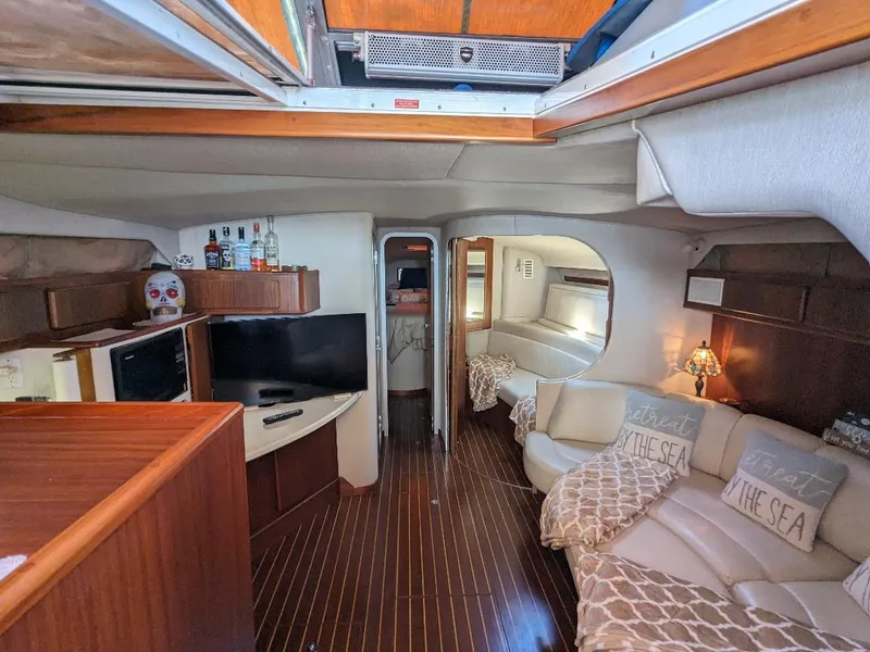 Slide: The Image of Luxurious interior of a 1994 Sea Ray 400 Express yacht with modern amenities. - 10