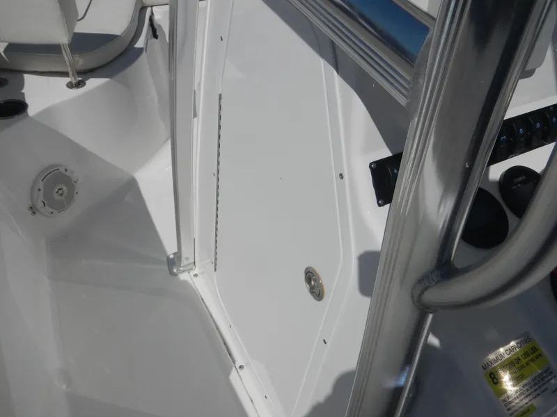 Slide: The Image of 2016 Sea Hunt Ultra 234 boat interior, featuring sleek design and modern fittings. - 11