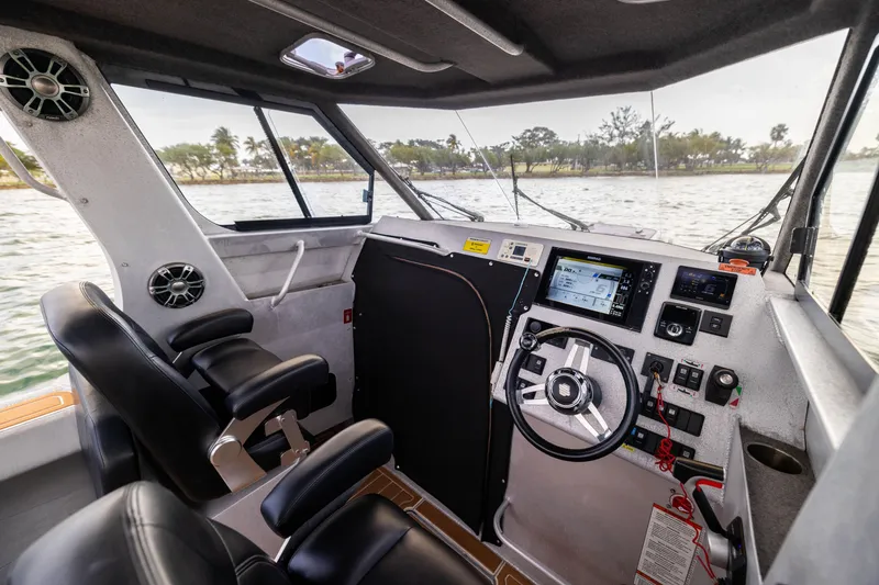 Slide: The Image of Interior of 2022 Sealegs 8.5M boat with modern steering and navigation system. - 15