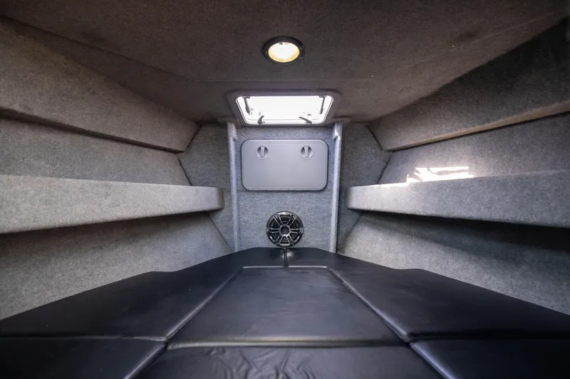 Slide: The Image of Interior cabin of 2022 Sealegs 8.5M boat with cushioned seating and overhead lighting. - 23