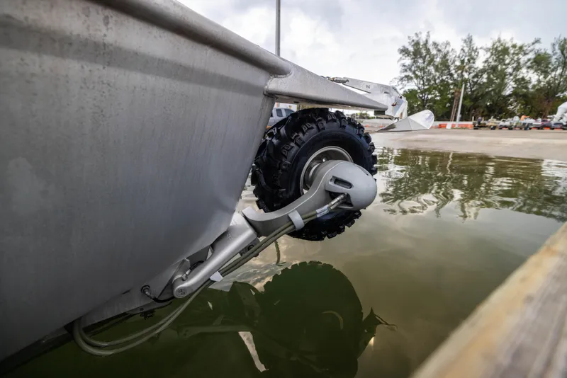 Slide: The Image of Sealegs 8.5M 2022 amphibious boat with retractable wheels in shallow water. - 25