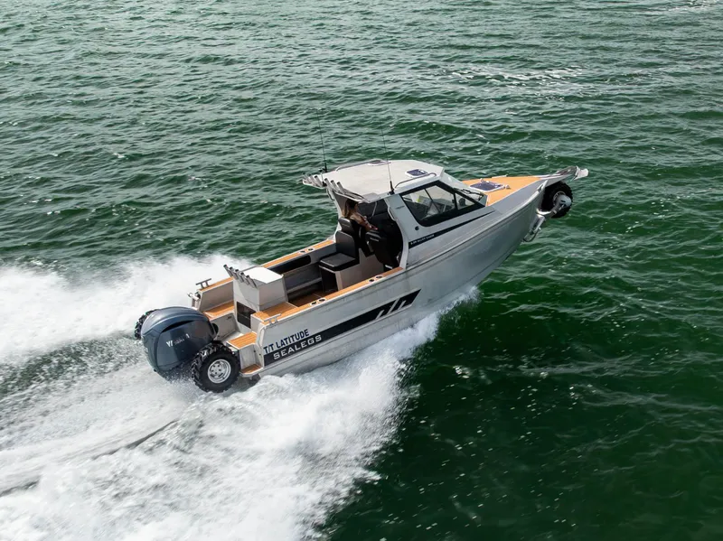 Slide: The Image of Sealegs 8.5M 2022 model boat cruising on water, showcasing speed and agility. - 34