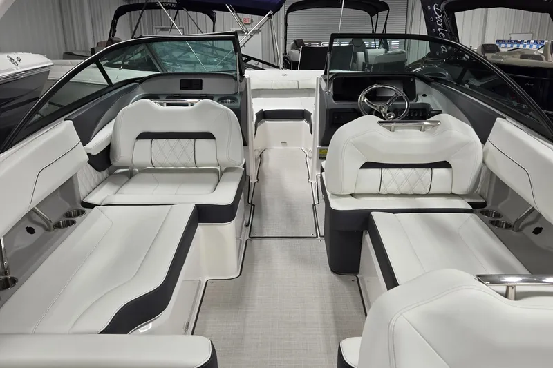 Slide: The Image of 2026 Regal LX2 boat interior with luxurious white seating and modern design. - 5