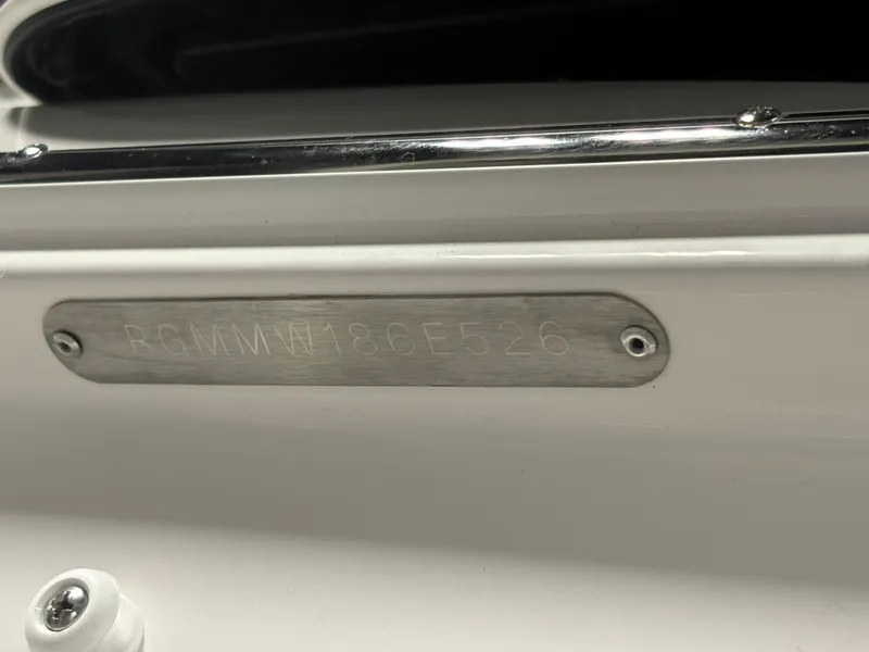 Slide: The Image of 2026 Regal LS6 Surf boat identification plate with serial number engraved. - 16