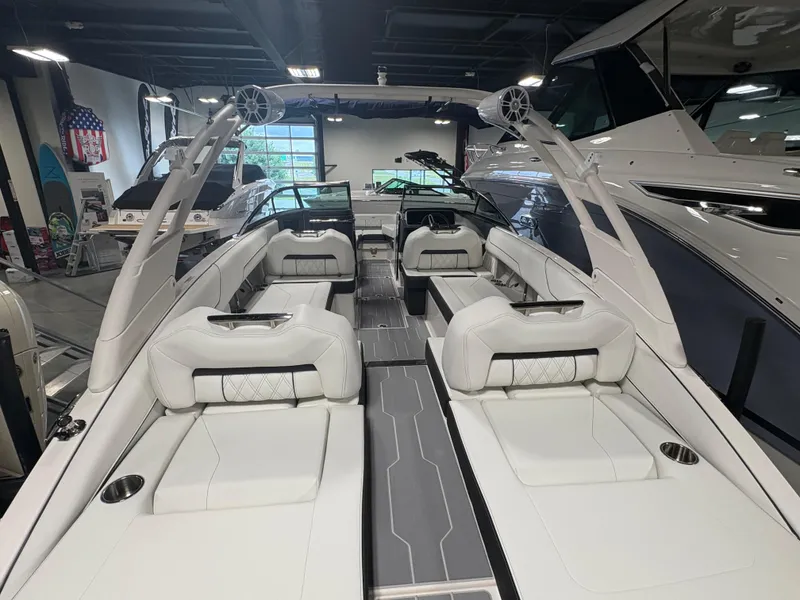 Slide: The Image of 2026 Regal LS6 Surf boat interior with luxurious white seating and modern design. - 4