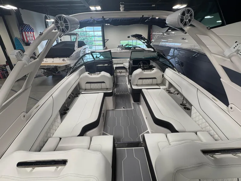 Slide: The Image of 2026 Regal LS6 Surf boat interior with luxurious white seating and modern design. - 5