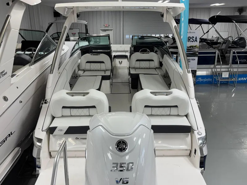 Slide: The Image of 2026 Regal LX6 boat interior with white seating and Yamaha 350 V6 engine. - 12