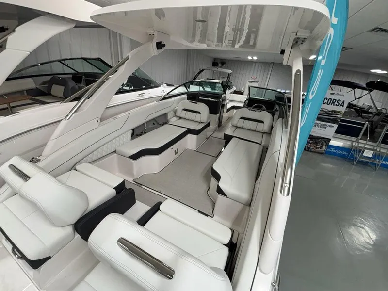 Slide: The Image of 2026 Regal LX6 boat interior with luxurious white seating and modern design. - 15