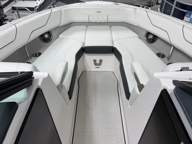 Slide: The Image of Luxurious interior of 2026 Regal LX6 boat with white seating and modern design. - 20