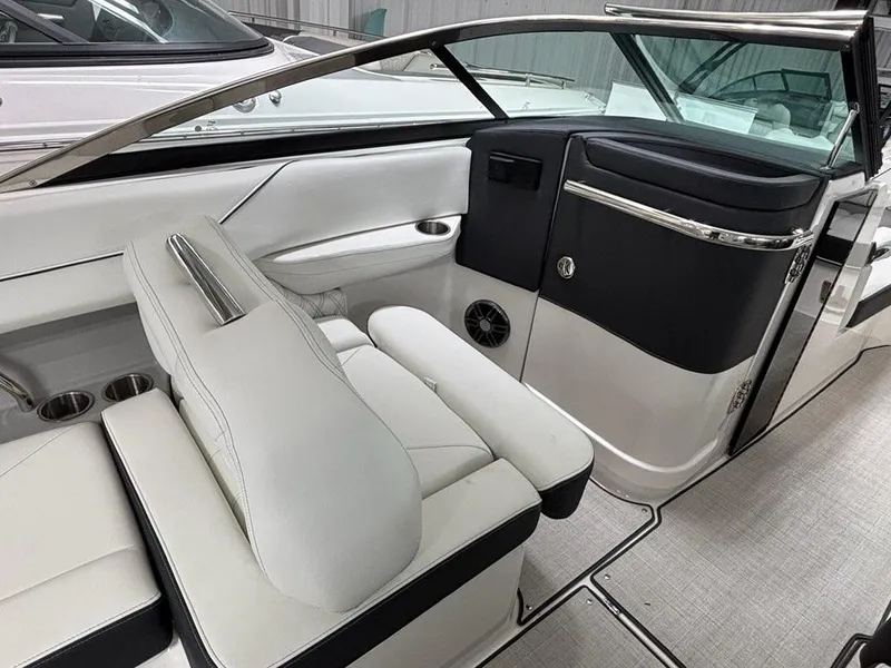 Slide: The Image of 2026 Regal LX6 boat interior with luxurious white seating and sleek design elements. - 24