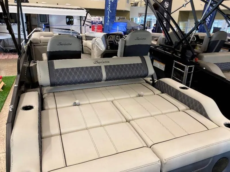 Slide: The Image of 2024 Lusso Ultra-Lounge 25UC boat interior with luxurious seating and modern design. - 5