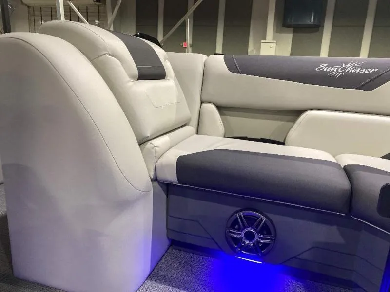Slide: The Image of Luxurious seating on 2024 Geneva Cruise SB 22 boat with ambient blue lighting. - 16