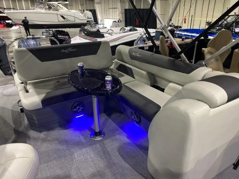 Slide: The Image of Luxurious 2024 Geneva Cruise SB 22 boat interior with plush seating and ambient lighting. - 17