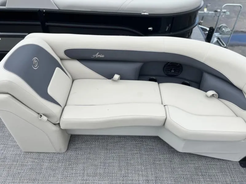 Slide: The Image of 2024 Aria Ultra-Lounge A22UC boat seating, featuring sleek white and gray upholstery. - 6