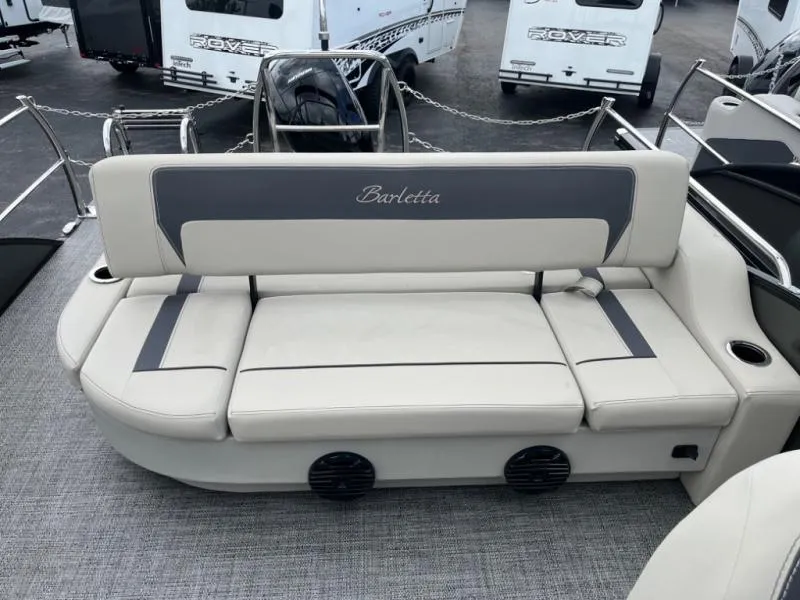Slide: The Image of Luxurious Aria Ultra-Lounge A22UC 2024 boat seating with elegant design and integrated speakers. - 9