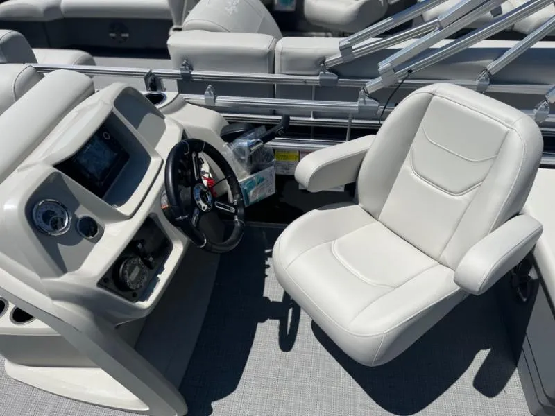 Slide: The Image of 2024 Vista Fish 20 boat interior with steering wheel and captain's chair. - 8