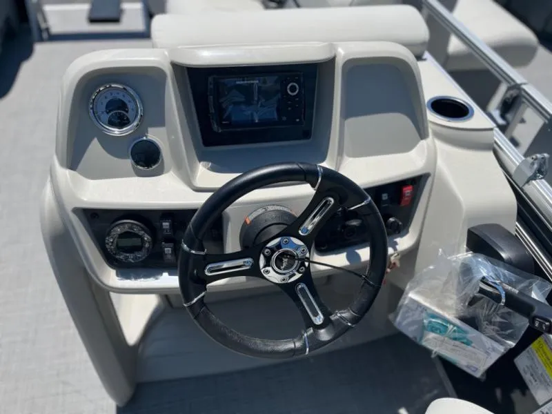 Slide: The Image of 2024 Vista Fish 20 boat dashboard with steering wheel and control panel. - 9