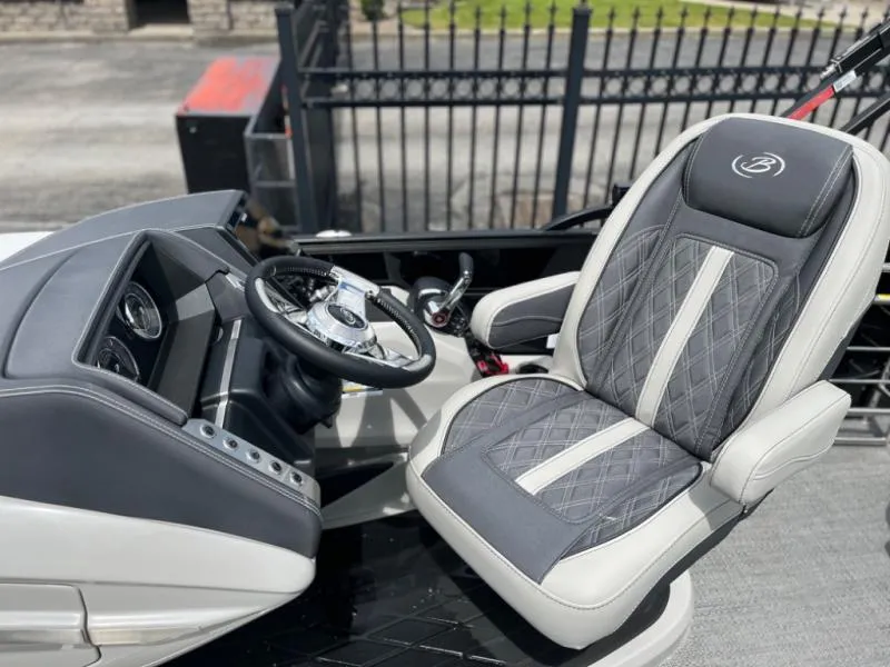 Slide: The Image of 2024 Lusso Ultra-Lounge L23UC boat seat and steering console, featuring luxurious design and craftsmanship. - 8