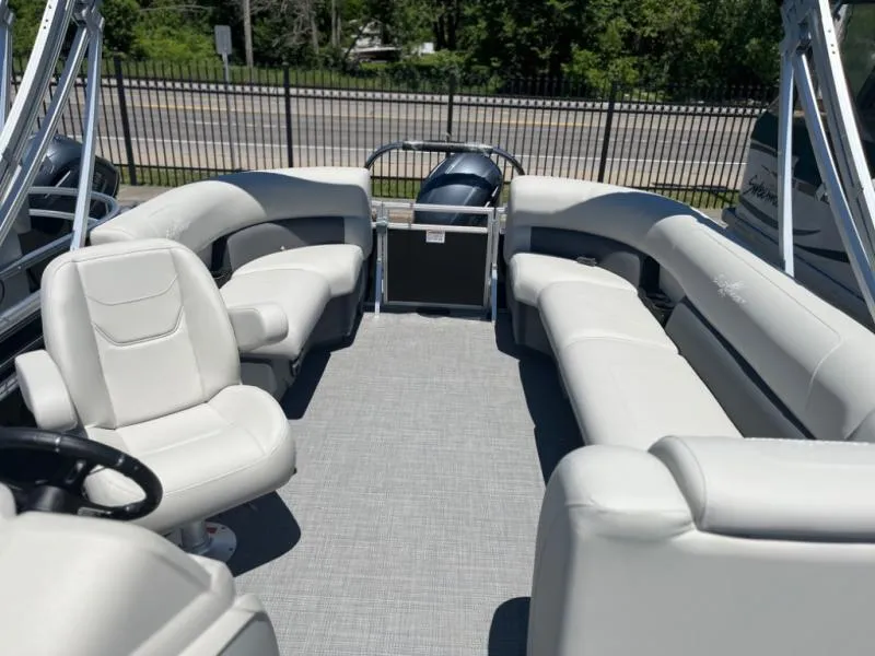 Slide: The Image of 2024 Vista 20 LR pontoon boat interior with spacious seating and modern design. - 10