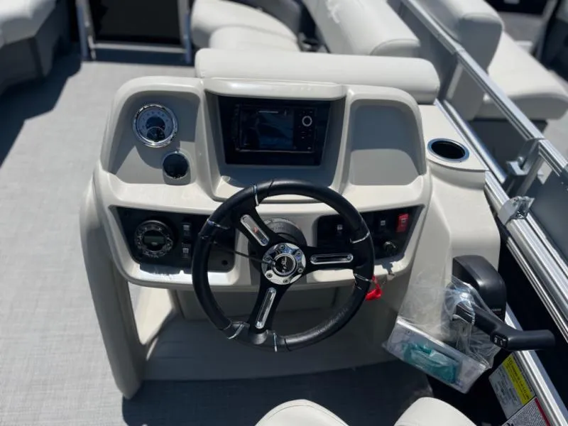 Slide: The Image of 2024 Vista 20 LR boat dashboard with steering wheel and control panel. - 9