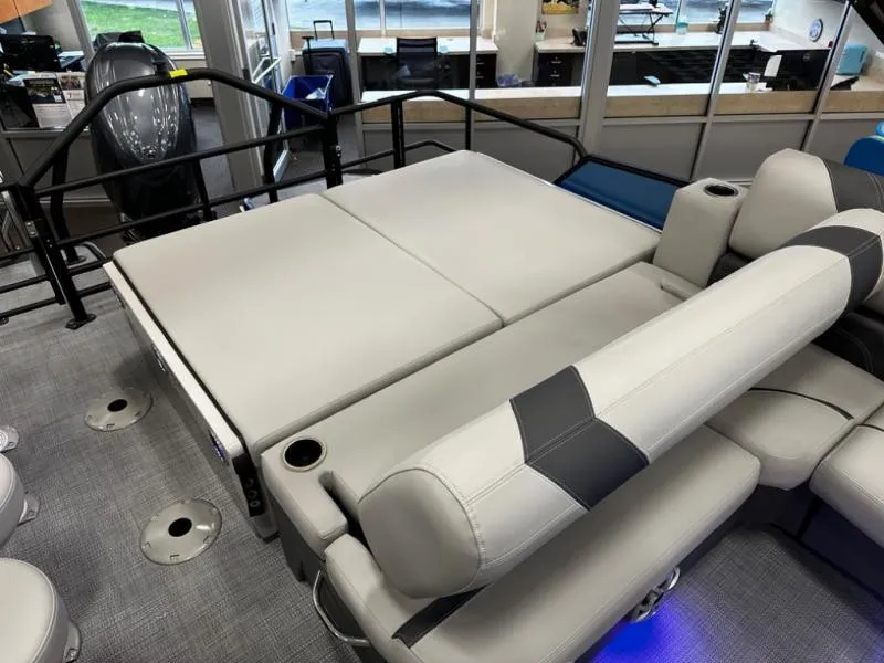 Slide: The Image of Luxurious seating area on 2025 L3 DLZ Bar boat, featuring comfortable gray upholstery. - 14