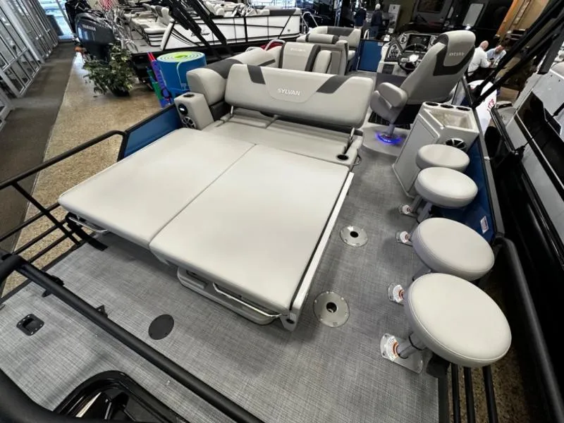 Slide: The Image of 2025 L3 DLZ Bar boat interior with gray seating and modern design. - 15