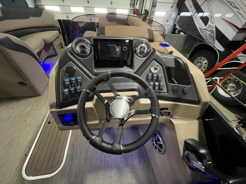 Slide: The Image of 2025 L3 DLZ DH Bar boat dashboard with steering wheel and control panel. - 10