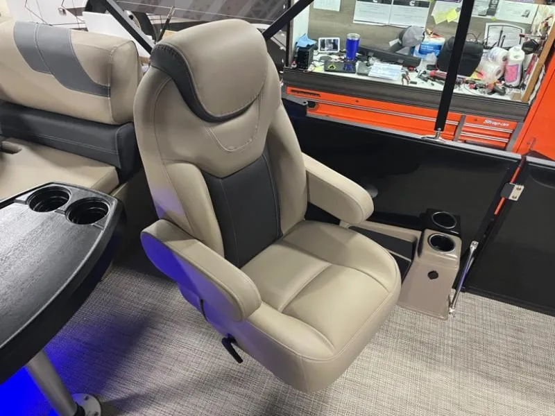 Slide: The Image of Luxurious beige captain's chair in a 2025 L3 DLZ DH Bar boat interior. - 11