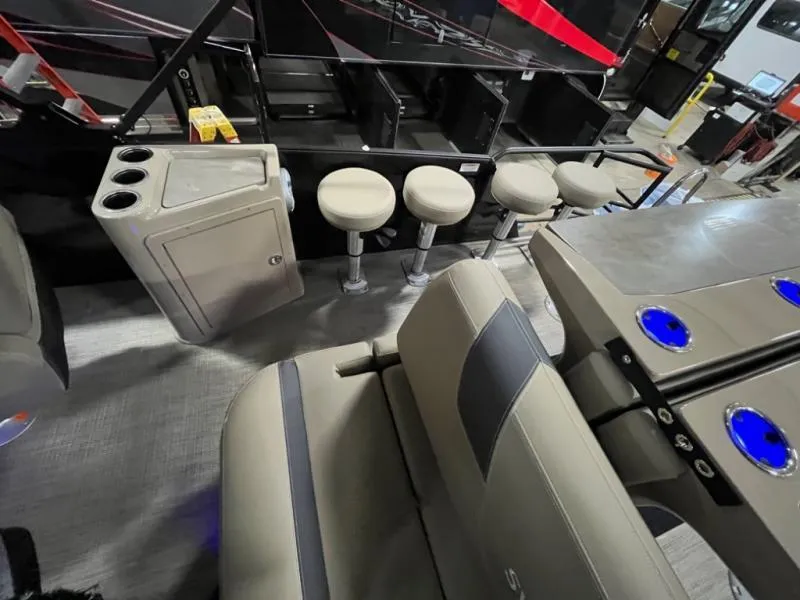 Slide: The Image of 2025 L3 DLZ DH Bar interior with stools, cup holders, and modern seating. - 13