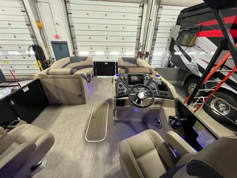 Slide: The Image of Interior of 2025 L3 DLZ DH Bar boat with modern seating and control panel. - 6