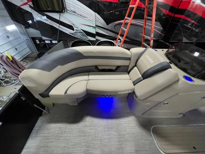 Slide: The Image of Luxurious Sylvan boat seating with ambient blue lighting, featuring modern design and comfort. - 8