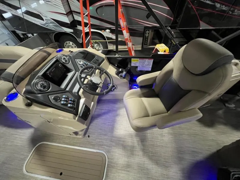 Slide: The Image of Captain's chair and control panel of 2025 L3 DLZ DH Bar boat, featuring modern design. - 9